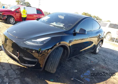 2023 Tesla Model Y Awd/Long Range Dual Motor All-Wheel Drive из США, поврежденный, VIN 7SAYGDEE1PA187657